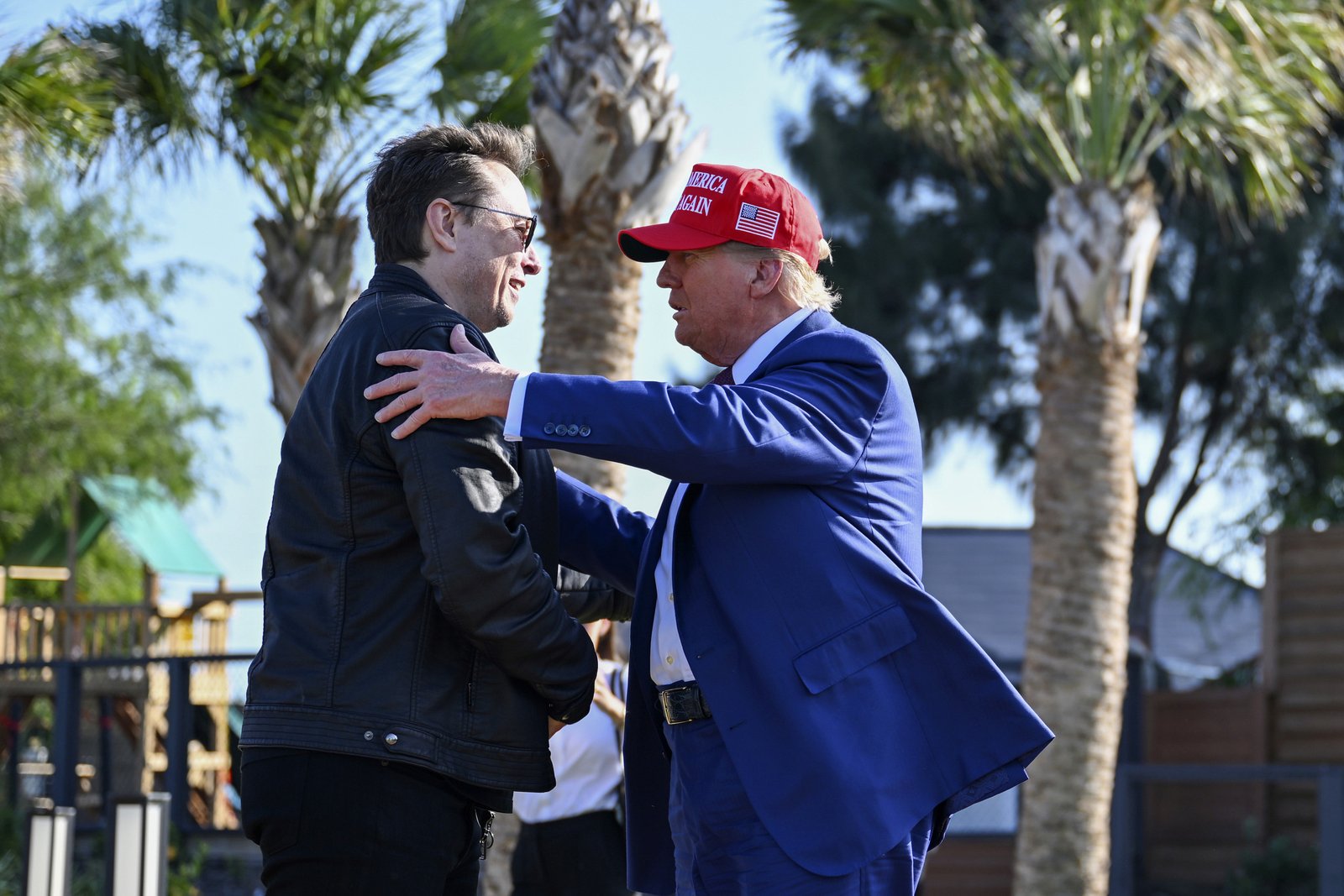 President-elect Donald Trump greets Elon Musk