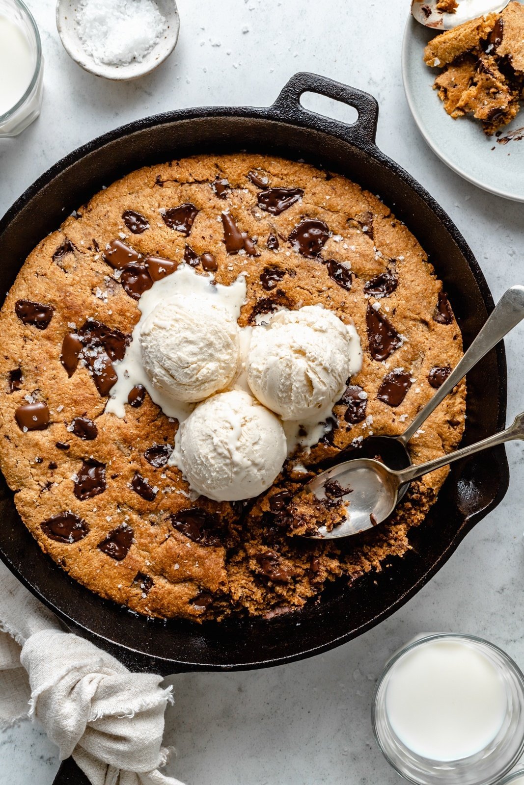 grain free chocolate chunk skillet cookie topped with ice cream